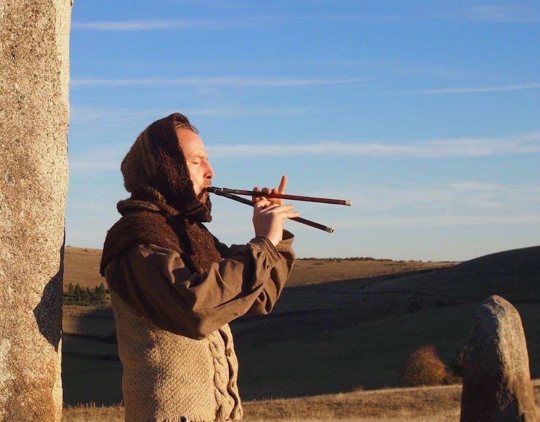 Max playing the Aulos at a megalithic site